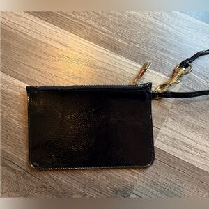 Black Sleek  Wristlet with Gold Hardware Excellent Condition Dustbag included
